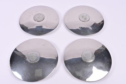 PORSCHE: A set of four Porsche hubcaps with chrome enameled crest. Fits 356C, 911, 912 Porsche models