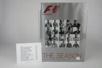 FORMULA 1: 'The Season' hardcover book signed by multiple F1 drivers including Alonso, Button, Webber.