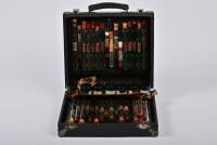 OIL SALESMAN: A rare and interesting salesman's leather travelling case of oil / petroleum samples, believed to be circa late 1930s