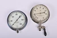 GAUGES: Two large postwar wall mounted pressure gauges by 'The British Thomson Houston Co Ltd.', 15cm across the face