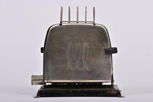 TOASTER: A circa 1950s electrictric toaster and toast rack, no cord, 21cm high, 21cm wide, 13cm deep