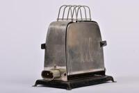 TOASTER: A circa 1950s electrictric toaster and toast rack, no cord, 21cm high, 21cm wide, 13cm deep - 2