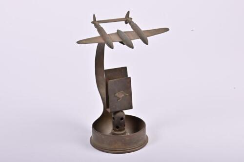 TRENCH ART: An Australian trench art featuring the de Havilland Vampire&nbsp;made from a shell case and bullets, 20cm high