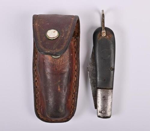 PENKNIFE: A vintage folding penknife in leather sheath, marked HB to blade, the blade 6cm long