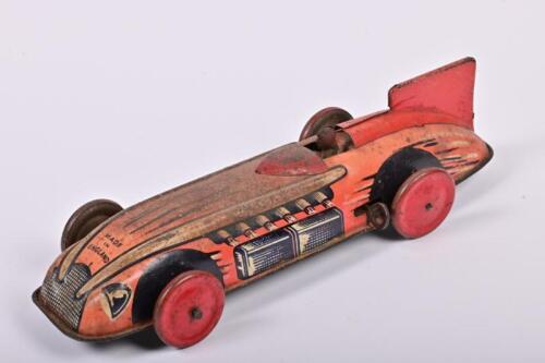 LAND SPEED RECORD: An original English tin land speed record car, 28cm long