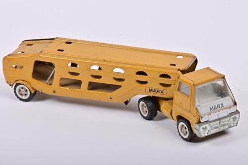 CAR TRANSPORTER: A Japanese vintage LOUIS MARX & CO, INC pressed steel car transporter