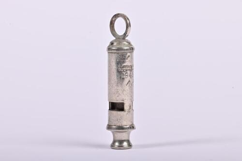 WHISTLE: A WWII officers whistle by J Hudson & Co Birmingham, stamped with date 1943 and a broadarrow