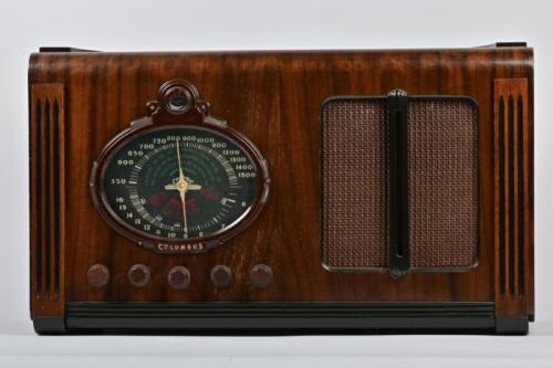 RADIO: A circa 1940s Columbus radio, with 'magic eye', 34cm high, 58cm wide, 27cm deep