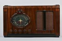 RADIO: A circa 1940s Columbus radio, with 'magic eye', 34cm high, 58cm wide, 27cm deep