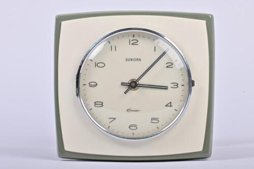 WALL CLOCK: A circa 1960s Europa 'Clomatic' wall clock, 21cm high, 21cm wide