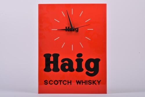 HAIG SCOTCH: A circa 1980s Haig Scotch Whisky acrylic wall clock, 40cm high, 31.5cm wide, 5cm deep