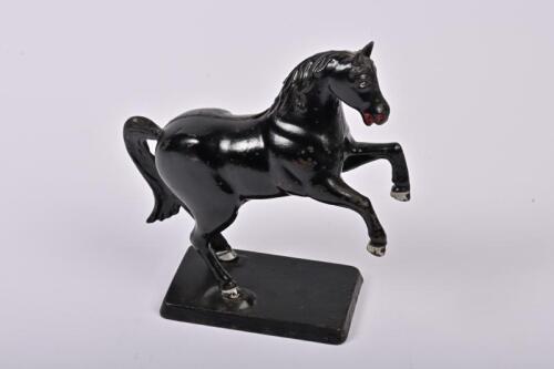 MONEY BOX: An American cast iron prancing horse form money box by Arcade/Williams between 1910-1934, 19cm high