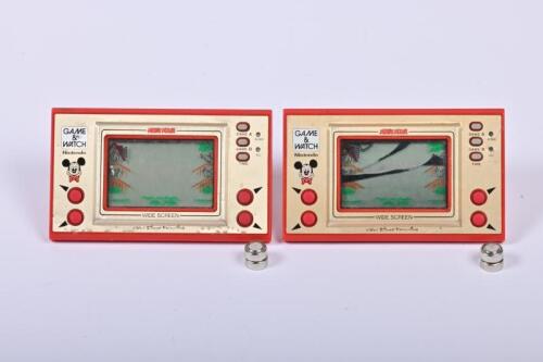 NINTENDO: Two Nintendo Game and Watch 'Mickey Mouse', widescreen, MC-25, released in 1981, both working
