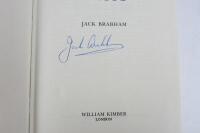 BRABHAM: 'When the Flag Drops' authored and signed by Jack Brabham. - 2