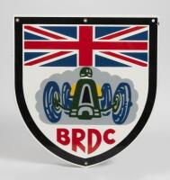 BRDC: A reproduction enamel shield form enamel sign of the British Racing Drivers Association, 43cm high x 40cm wide