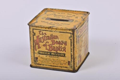 MONEY BOX: A circa 1920s Australian 'Australian Board of Baptist' tin money box, 8cm high