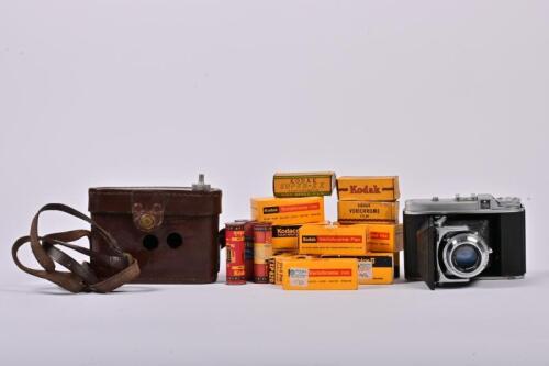 CAMERA: A 1952-1955 Voigtlander Perkeo II camera in handmade leather case by AL Waddington & Son, Sydney, together with a collection of old film stock