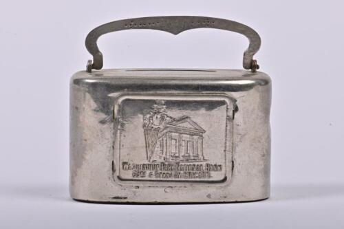 MONEY BOX: A 1915 American Washington Park National Bank nickel plated steel money box, 5.5cm high