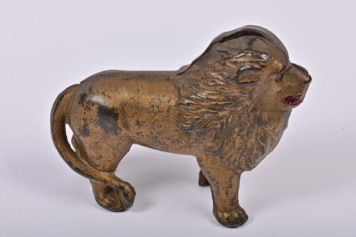 MONEY BOX: An American cast iron loin form money box by AC Williams between 1905-1931, 10cm high
