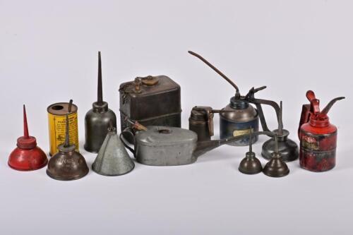 OILERS: A collection of mid-20th century oilers and an oil can, the largest 22cm high