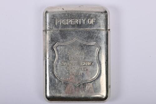 MONEY BOX: A 1930/40s American nickel plated tin Spokane County Savings Pocket Bank money box by COI Burns & Co, 8.5cm high