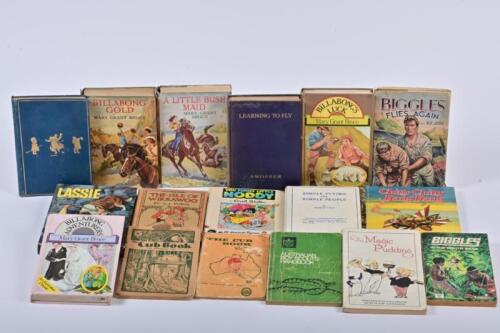 A collection of vintage children's books, including Biggles, Noddy and Lassie