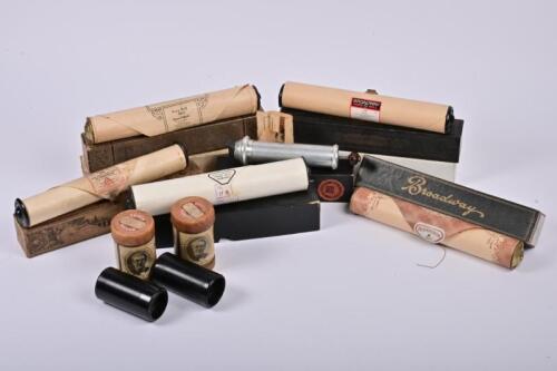PIANOLA ROLLS: A collection of five vintage pianola rolls, two edison records and a Kleernote suction pump for pianos, the largest box 32cm wide