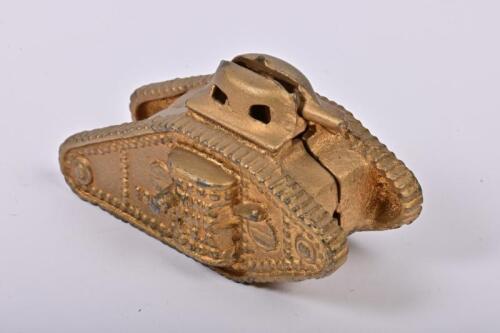 MONEY BOX: A 1920s American bronze painted cast iron tank form money box made by AC Williams, 6cm high