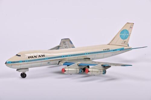 PAN AM: A 1960s Japanese lithograph printed friction driven tin toy of a Pan Am aeroplane by ATC, 55cm long, 49cm wide
