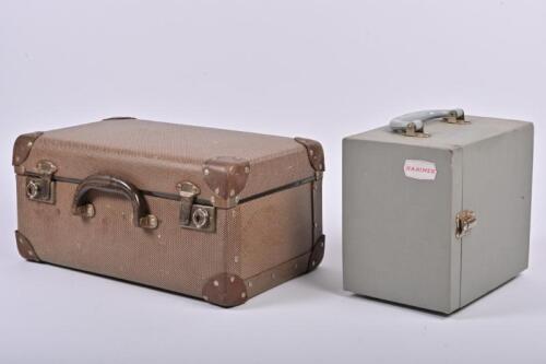 PROJECTOR: A Braun 'Paximat' projector in carry case, with original instruction booklet and magazine, together with a small Hanimex slide filing cabinet,