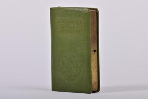 MONEY BOX: A 1930s English vinyl covered steel Blackburn Trustee Savings Bank book form money box, 12cm high