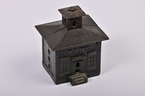MONEY BOX: A 1872 American cast iron Cupola money box made by J&E Stevens, 10.5cm high