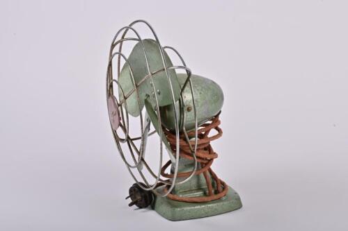 FAN: A mid-century Mistral cast iron fan, in green hammerite finish, 32cm high