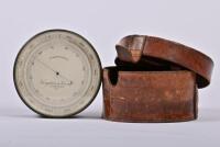 POCKET BAROMETER: A circa 1870s Troughton & Simms pocket barometer, serial number 1619, in brass drim case and leather carrying case, 12cm across the dial