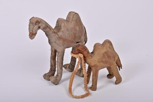 TRENCH ART: Two WWII trench art leather camels, made in North Africa by an Australian soldier for his daughters, purchased from one of the daughters in East Gippsland, Victoria, the tallest 22cm high