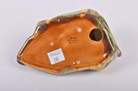 ROSEDALE: A circa 1958 New South Wales Rosedale Pottery slip cast figure of a platypus, bears label to side and stamped to base: Modelled by Rosedale, 14 cm wide - 4