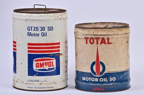 MOTOR OIL DRUMS: Two five gallon motor oil drums from 'AMPOL' and 'TOTAL'