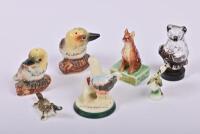 AUSTRALIANA: A collection of mid-20th century pottery souvenirs, including the Dog on a Tucker from Gundagai, and salt and peppers in the form of Kookaburras from Mildura, the dog on a tuckerbox 8.5cm