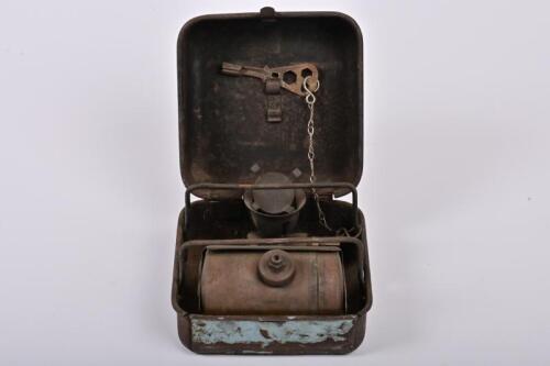 CAMP STOVE: A vintage kerosene burning camping stove, 8cm high, 13cm wide, 13cm deep