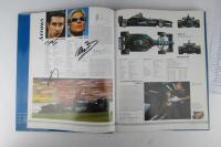 FORMULA 1: 1998/99 F1 Yearbook with multiple F1 signtures including Brawn, Schumacher, Todt. - 6