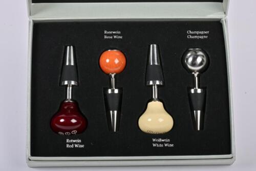 MERCEDES: An official Mercedes bottle stopper boxed set in gear knob form, for red, rose and white wines plus champagne.