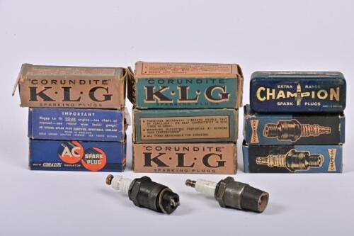 SPARK PLUG: A group of KG and AC spark plugs, most unused in boxes.