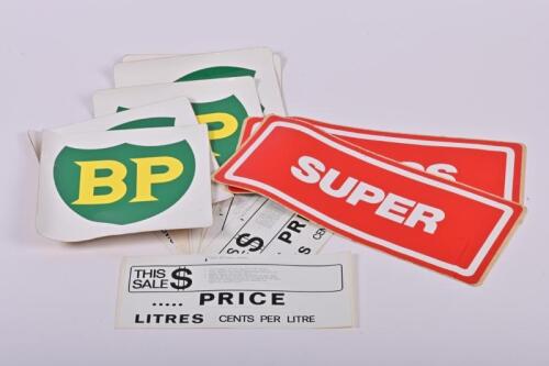 BOWSER STICKERS: A collection of petrol bowser stickers including 'SUPER' & 'BP' shield