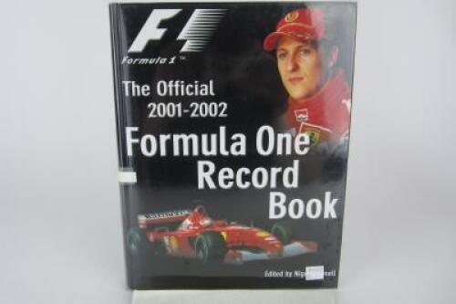 FORMULA1: 'The Official 2001 - 2002 Formula One Record' Book. Signed Schumacher with CoA.