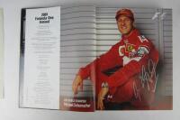FORMULA1: 'The Official 2001 - 2002 Formula One Record' Book. Signed Schumacher with CoA. - 2