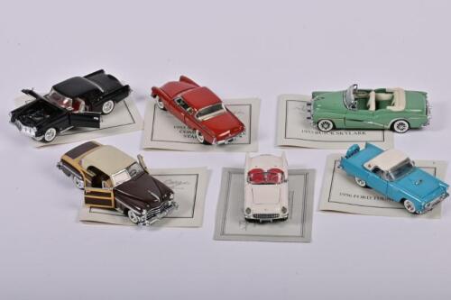 FRANKLIN MINT: A group of six 1:43 scale Franklin Mint - 'The Classic Cars of the Fifties'. Includes 1953 STUDEBAKER COMMANDER STARLINER & 1955 CHEVROLET BEL AIR