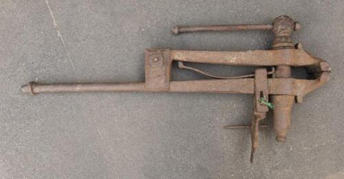 VICE: A large and heavy 19th century industrial cast iron vice, 52cm high, 104cm long, 14cm wide
