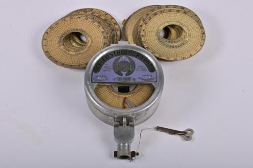 LE CONTROLLERGRAPHE: A late 20th century French 'Le Controllergraph' mileage and time tracker with unused discs and key, used by truck drivers