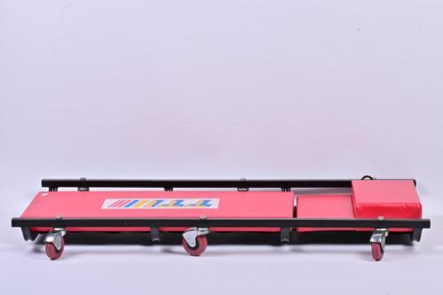 CAR CREEPER: A TTI car creeper with adjustable headrest, 102cm long, 43cm wide, 12cm high