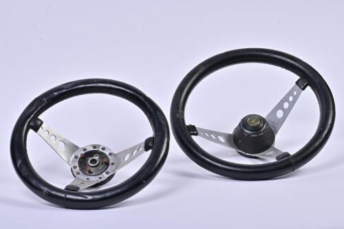 STEERING WHEELS: Two deep dish steering wheel, one with central Ford Falcon logo, 33cm and 37cm diameter